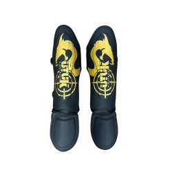 Espinilleras muay thai Utuk hunter negro oro